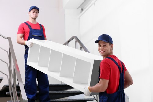 Packing boxes and careful household organisation during a local move in Beddington