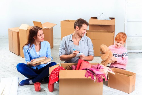 Removal van and movers preparing a home move in Beddington