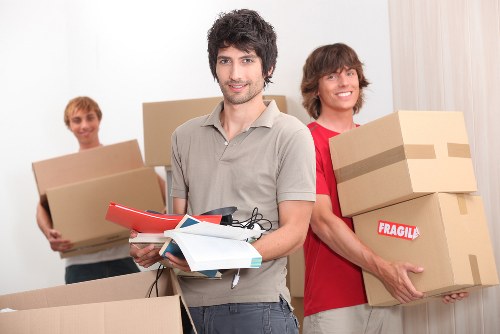 Preparing an office move with labelled boxes and furniture