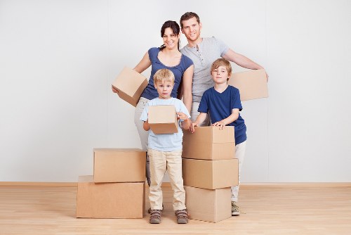 Moving boxes and household items from a flat in Beddington