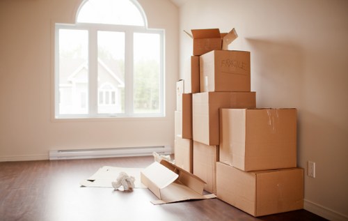 Packing boxes and furniture ready for a home move in Beddington