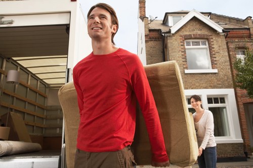 Boxes and wrapped furniture staged for a smooth move in Beddington