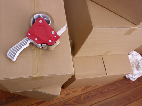 Professional movers handling bulky furniture in the Beddington area